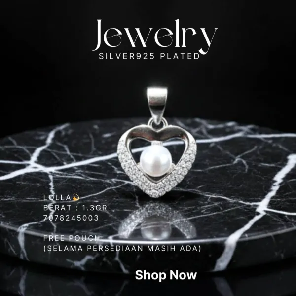 Liontin perak 925 model Lolla bentuk hati dengan mutiara dan zirkonia di atas marmer hitam