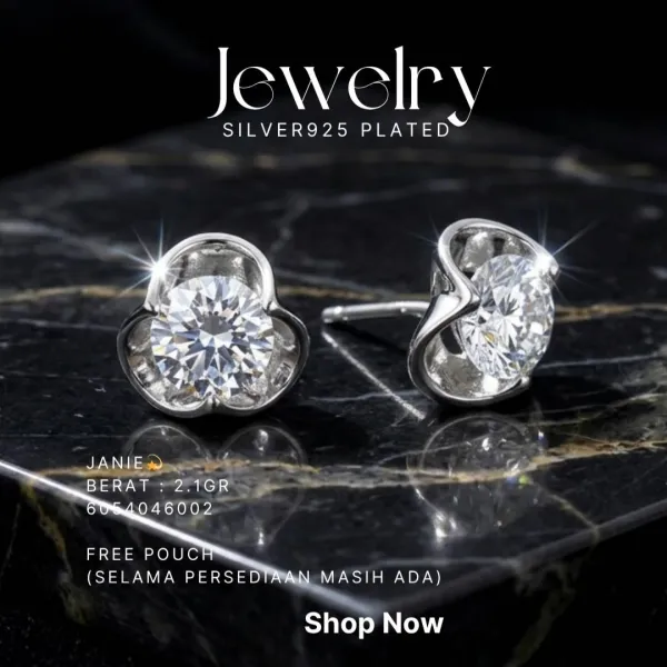 Anting perak 925 model Janie dengan zirkonia bulat besar di atas marmer hitam