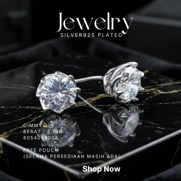 Anting perak 925 model Cimmy dengan zirkonia bulat besar di atas marmer hitam