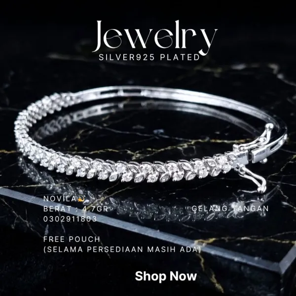 Gelang perak 925 model Novila bangle dengan zirkonia motif daun di atas marmer hitam