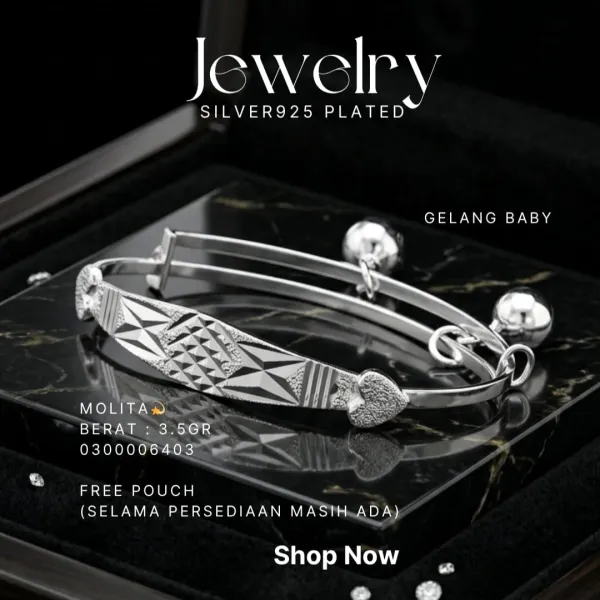Gelang Anak perak 925 model Molita bayi dengan lonceng dan ujung hati di atas marmer