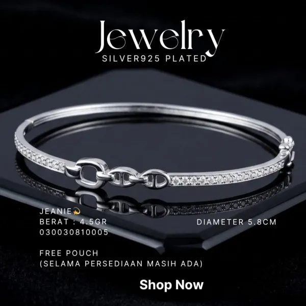Gelang perak 925 model Jeanie bangle dengan zirkonia dan mata rantai di atas dasar hitam