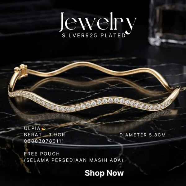 Gelang perak 925 model Ulpia bangle warna gold bergelombang dengan zirkonia di atas marmer