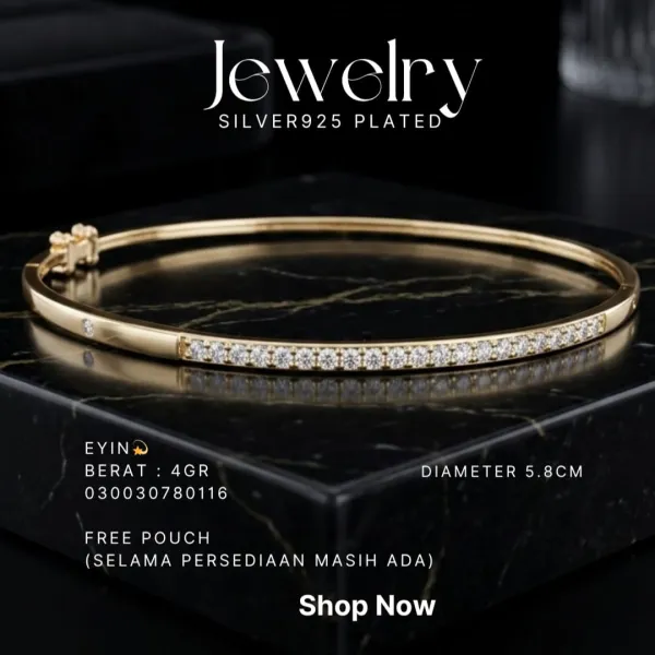 Gelang perak 925 model Eyin bangle warna gold dengan deretan zirkonia di atas marmer hitam