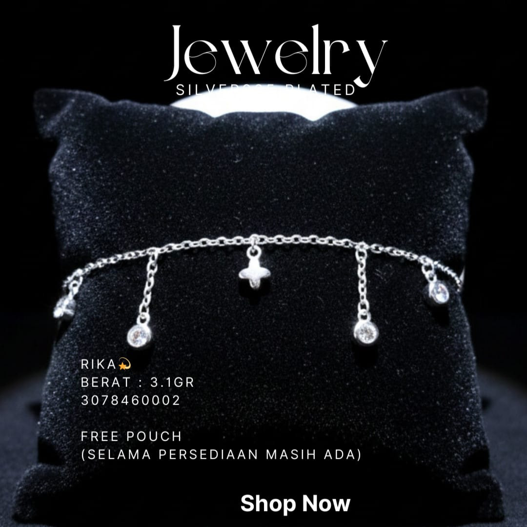 Gelang perak 925 model Rika rantai dengan liontin zirkonia gantung di atas bantal hitam