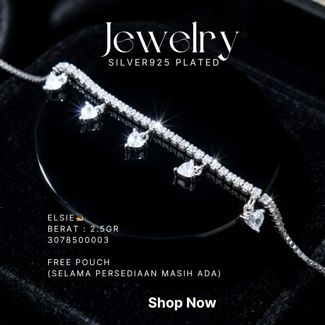 Gelang perak 925 model Elsie dengan zirkonia berjajar dan charm hati di atas kain hitam